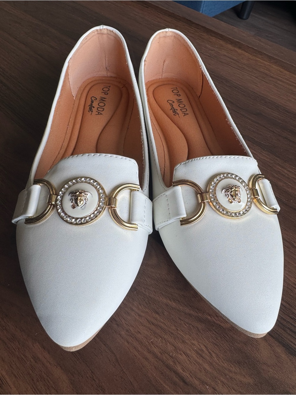 Women’s White Loafers with Gold Medallion Detail